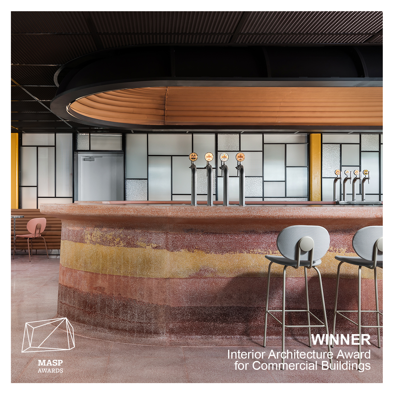 The Cisk Tap rooftop bar at The Brewhouse, featuring a centrally placed beer counter, winner of the Malta Architecture and Spatial Planning Interior Architecture Award for Commercial Buildings