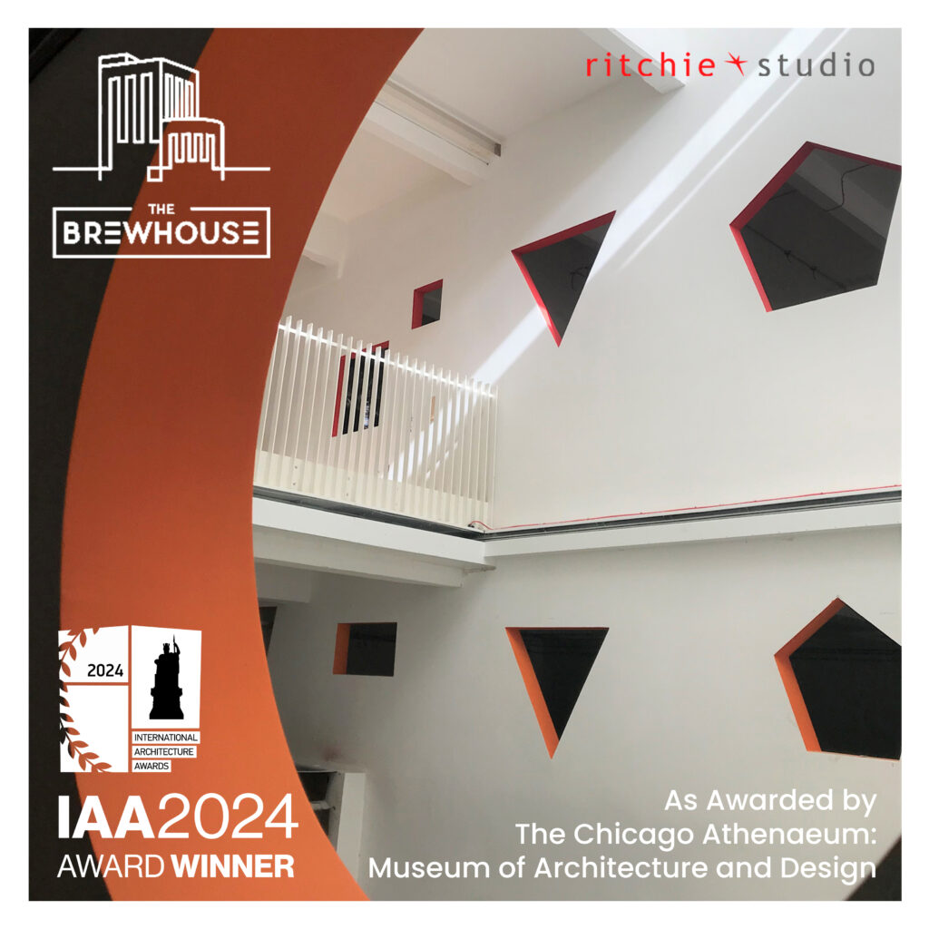 Interior of The Brewhouse showcasing unique geometric windows, awarded The International Architecture Award® 2024 in the Mixed Use category by The Chicago Athenaeum: Museum of Architecture and Design, designed by Ritchie Studio.